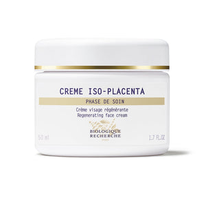 White jar of Biologique Recherche Crème ISO-Placenta face cream with gold accents, promising regeneration and reducing pigmentation.