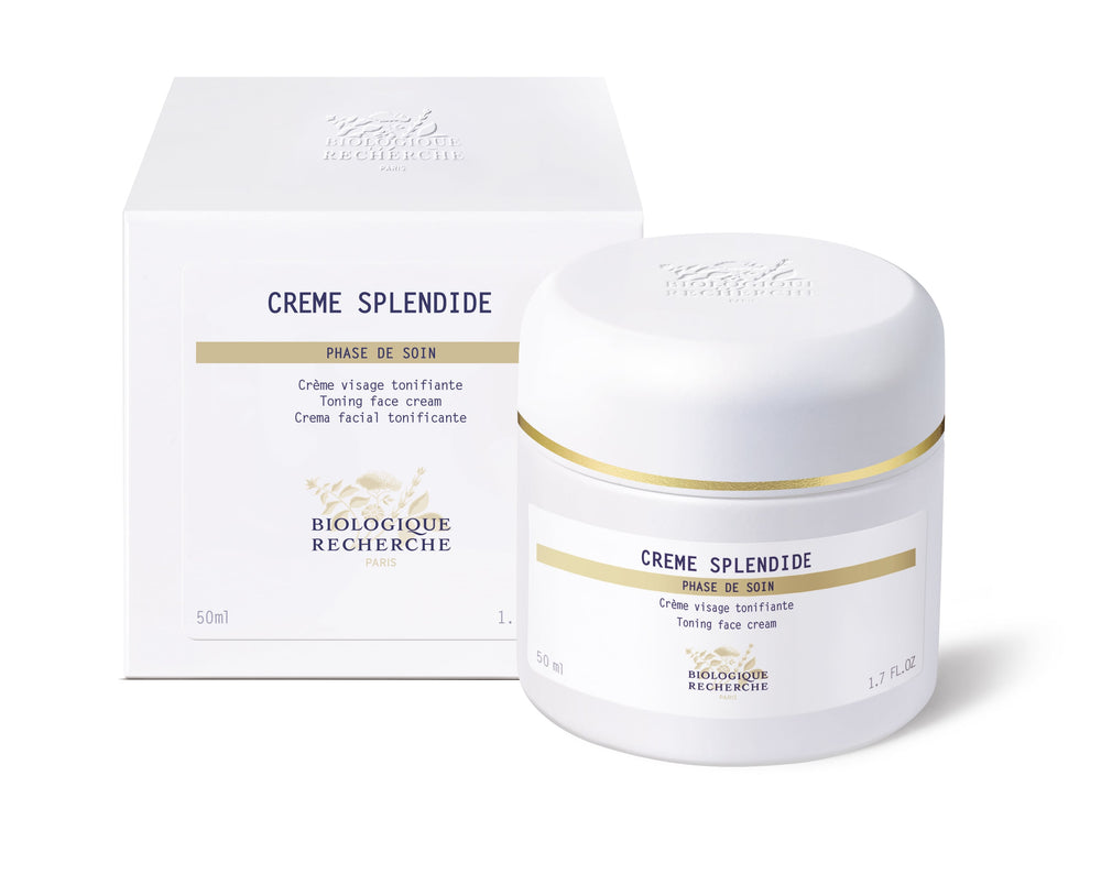 The Biologique Recherche Crème Splendide comes in a white jar adorned with a gold stripe near the lid. Labeled as a toning face cream for aging skin, this luxurious product aims to firm and enhance radiance and vitality.