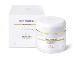 A jar and box of Biologique Recherche Crème Splendide, a toning face cream for aging skin, set against a white background.