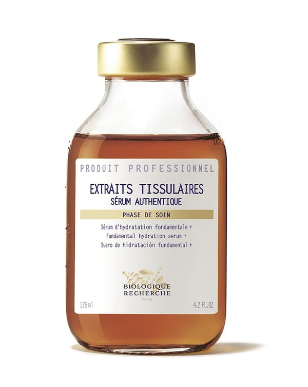 A 125ml, 4.2 fl oz glass bottle with a gold cap contains Biologique Recherche Serum Extraits Tissulaires, an instant moisturizer that boosts skin's protective barrier for lasting hydration.