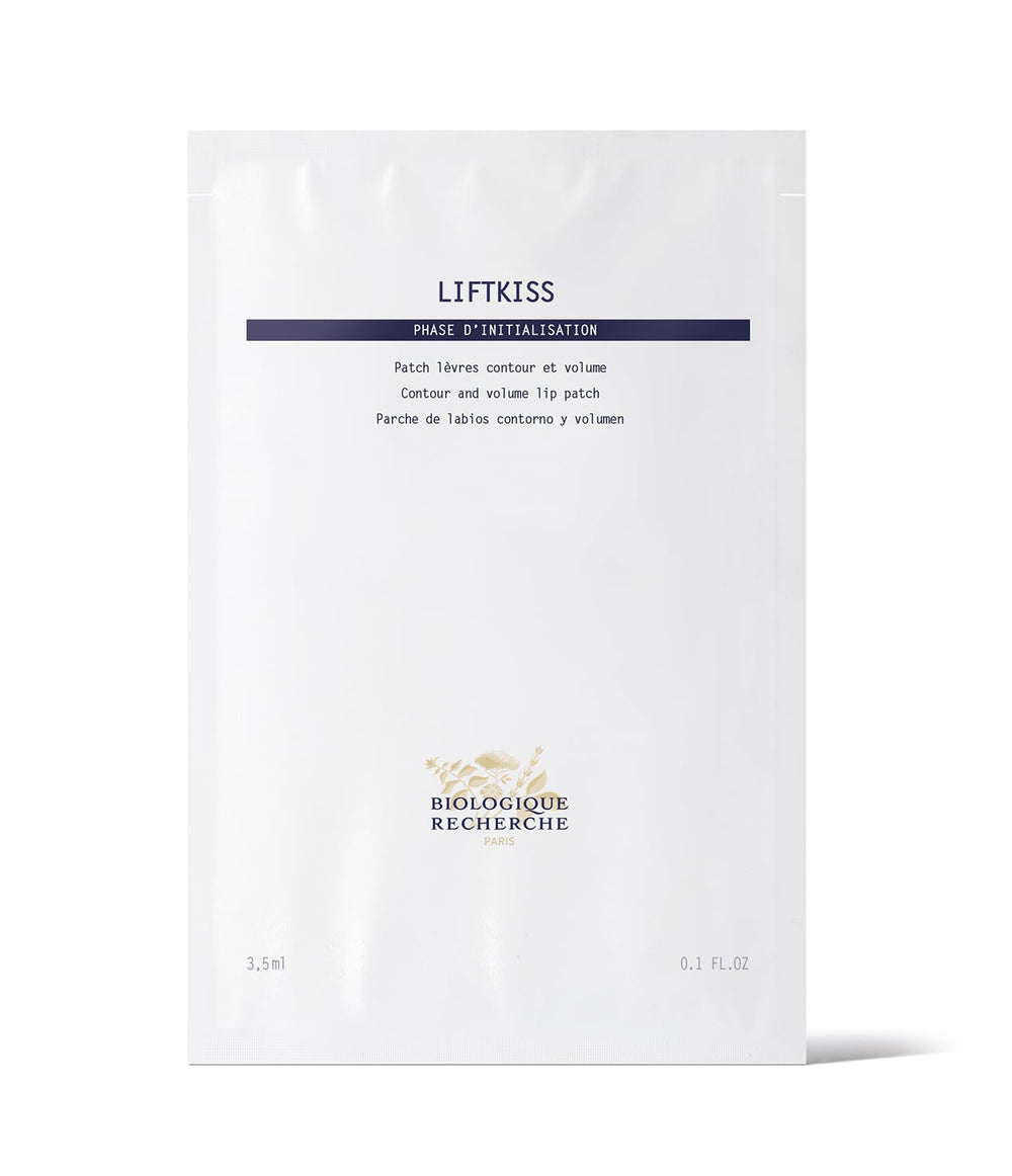 The Biologique Recherche Liftkiss lip patch, in minimalist white packaging, features text on its powerful formula to repair lips and reduce dehydration wrinkles, promoting plumper lips.