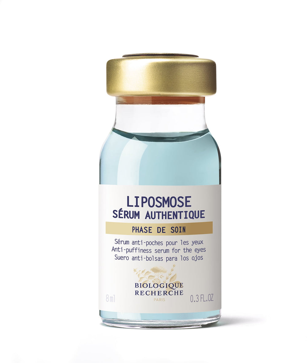An 8 ml glass vial of Biologique Recherche Serum Liposmose - Small, containing light blue serum for reducing puffiness and under-eye bags, is displayed against a white background.