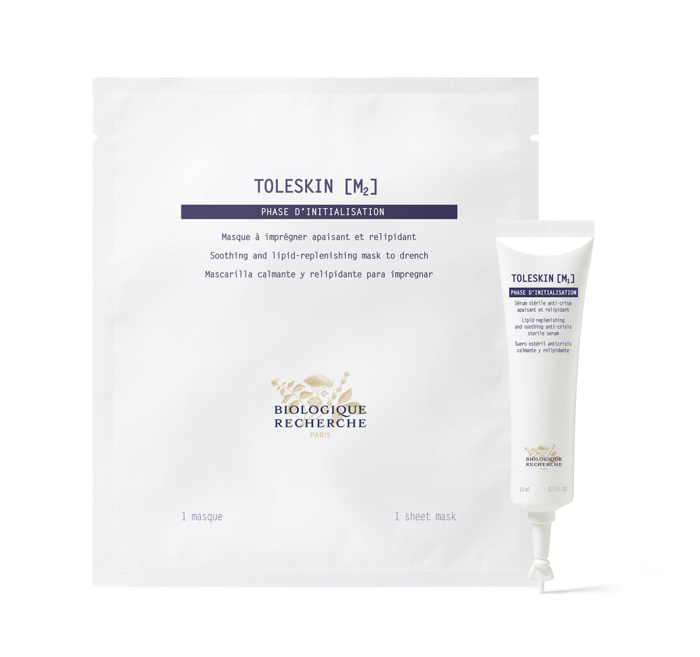 The Biologique Recherche Masque Toleskin sheet mask and cream tube, set against a plain background, are crafted to soothe skin reactions and shield the epidermis from external stress.