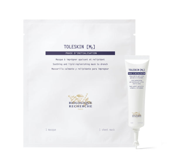The Biologique Recherche Masque Toleskin sheet mask and cream tube, set against a plain background, are crafted to soothe skin reactions and shield the epidermis from external stress.
