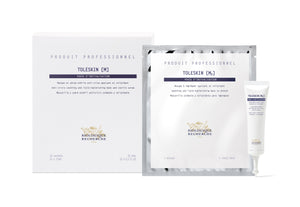 The Biologique Recherche Masque Toleskin comes in a box, a sachet, and a tube to soothe skin overreactions. Labeled "Produit Professionnel" and "Phase D’initialisation," it's perfect for calming the epidermis under external stress.