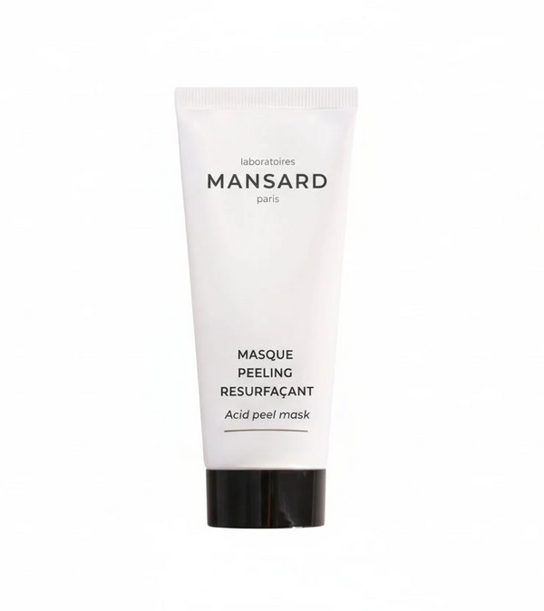 A white tube labeled "Mansard Masque Peeling Exfoliant," an exfoliating mask formulated to brighten the complexion, is displayed against a plain white background.