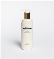 A white bottle with a pump dispenser labeled "Biologique Recherche Lait E.V. - 8.4 oz" stands against a plain background, offering a gentle cleanser designed to hydrate and nourish dehydrated skin.