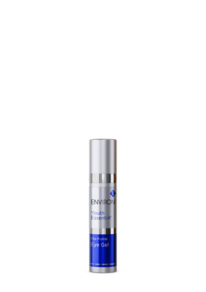 A small, cylindrical bottle labeled "Environ Youth-EssentiA Vita-Peptide Eye Gel" with a silver cap and blue-and-white design contains peptides to address anti-aging concerns for a youthful appearance.