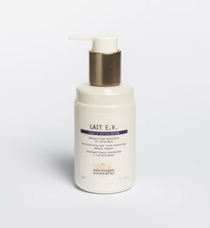 A bottle of Biologique Recherche Lait E.V. sits on a plain background, featuring a pump dispenser in elegant white and gold. Perfect for dehydrated skin, it also serves as a soothing cleanser to gently remove impurities.