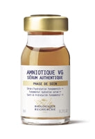 A small bottle labeled "Amniotique VG 0.3" with a golden cap, containing a light-colored liquid.