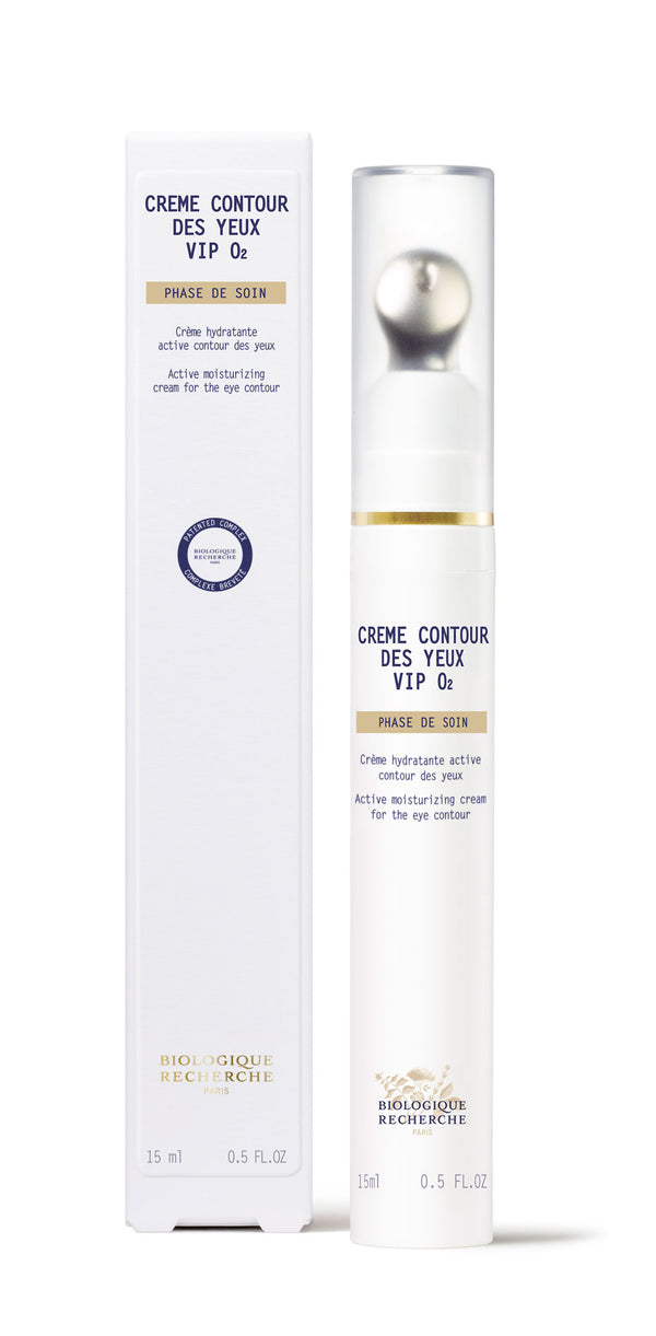 A white and gold 15ml bottle of New Formula - Creme Contour des Yeux VIP O2 brightening eye cream is shown beside its box—designed to target dark circles.