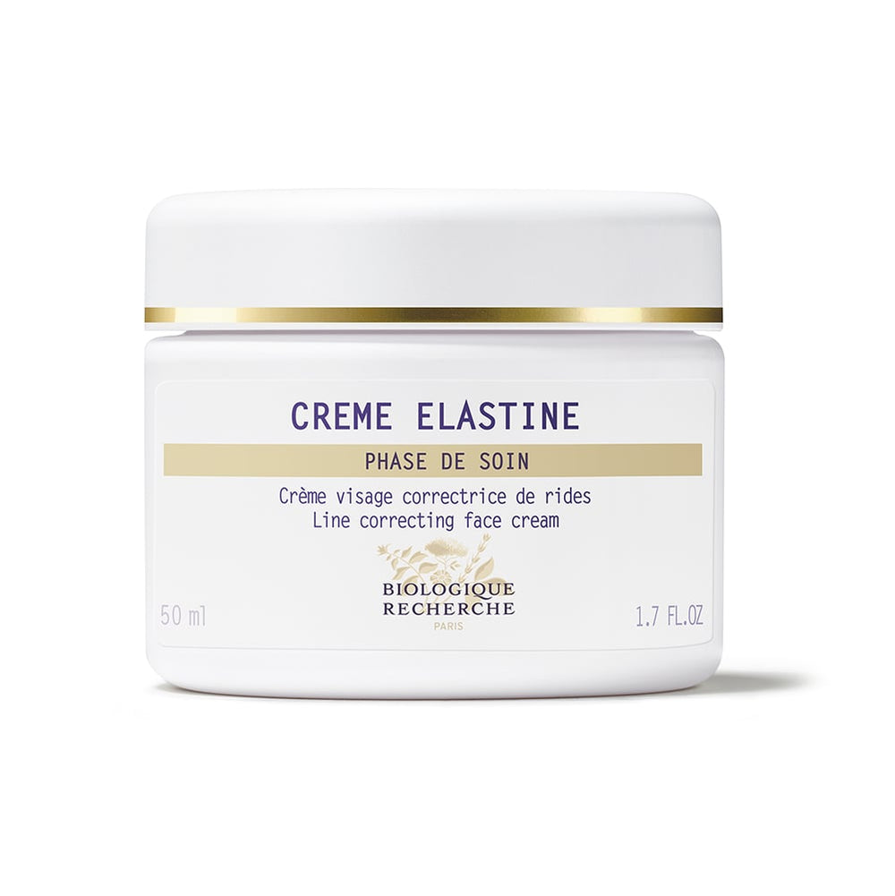 Biologique Recherche Crème Elastine, a 50 ml white and gold jar of regenerating face cream, is a luxurious anti-aging solution crafted to correct lines.