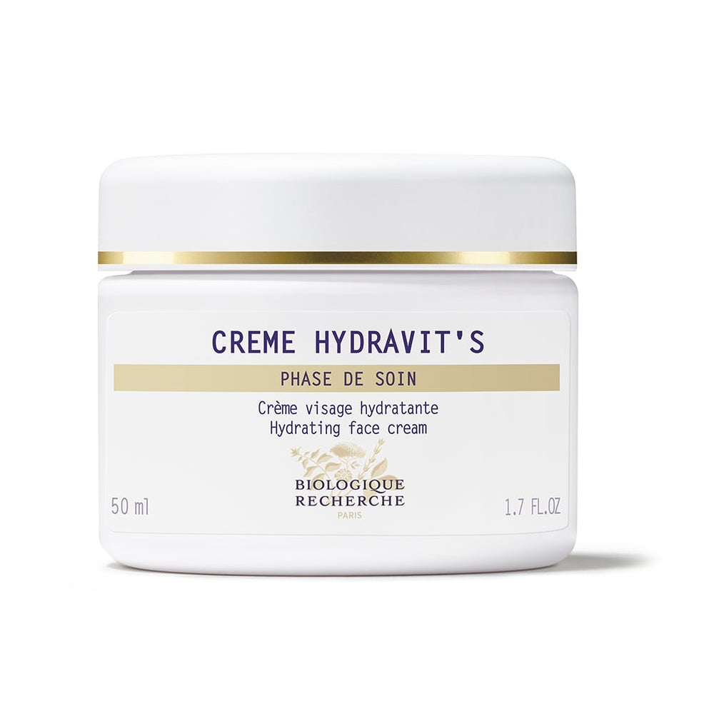 A 50 ml jar of Biologique Recherche Crème Hydravit's, a hydrating face cream with yeast extracts, elegantly sits against a pristine white backdrop.