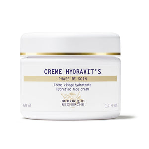 A 50 ml jar of Biologique Recherche Crème Hydravit's, a hydrating face cream with yeast extracts, elegantly sits against a pristine white backdrop.