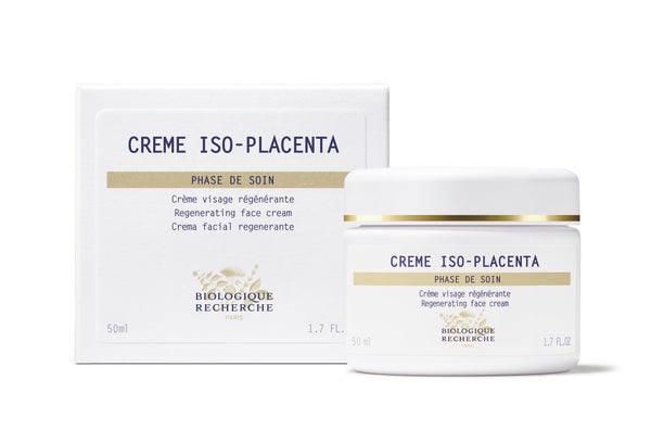 A white jar and box of Biologique Recherche Crème ISO-Placenta, a regenerating and reconstructing face cream that reduces pigmentation, are elegantly displayed on a pristine white background.