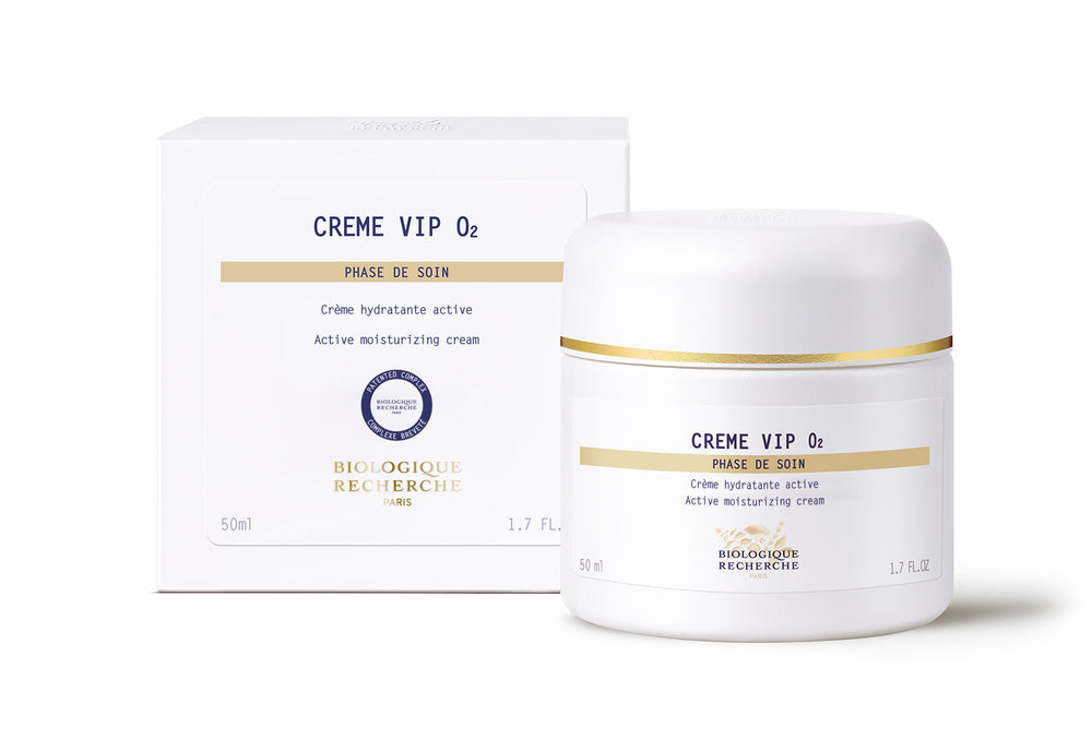 A white jar labeled "New Formula - Crème VIP 02" holds an oxygenating face cream with a smooth, creamy texture that provides active moisturizing and regenerating benefits.