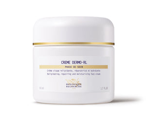 Biologique Recherche Crème Dermo RL is a white jar of face cream with gold lid accents, known for its lipid-replenishing and repairing properties, enhanced with moisturizing Hyaluronic Acid.