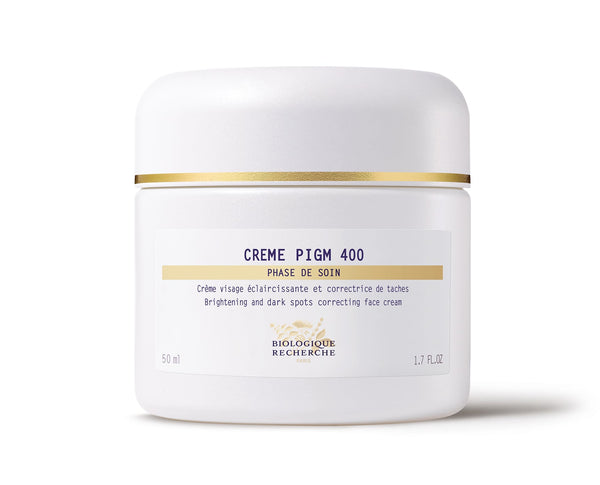 A 50 ml white jar of Biologique Recherche Crème PIGM 400, a brightening and dark spot-correcting face cream, effectively enhances complexion with its powerful lightening properties.