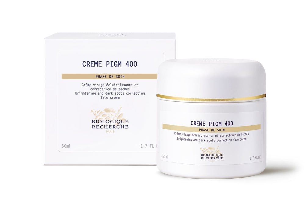 A 50 ml white jar of Biologique Recherche Crème PIGM 400, a brightening and dark spot-correcting face cream, effectively enhances complexion with its powerful lightening properties.