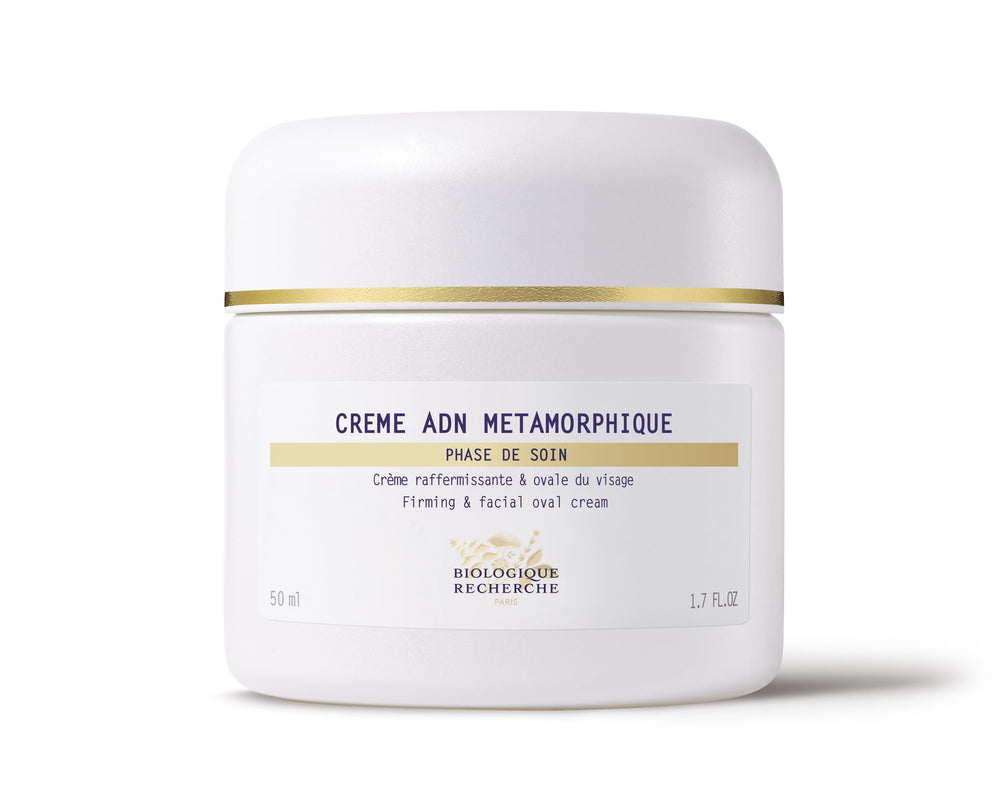 Biologique Recherche Crème ADN Metamorphique, 50 ml, is an anti-aging firming facial cream in a white jar with a gold stripe near the lid for lifting effects.