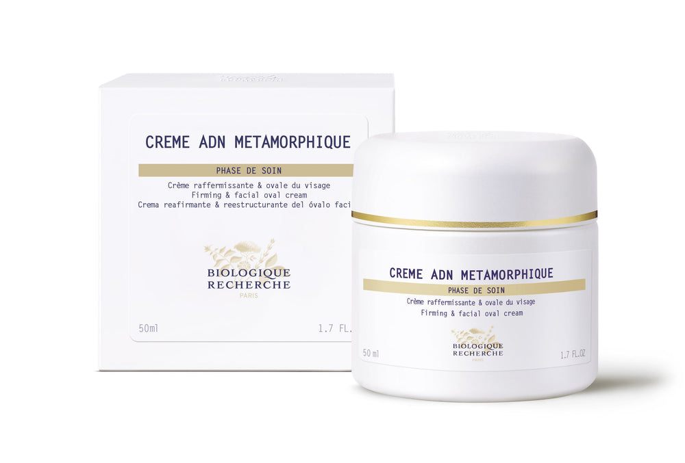 White jar of "Biologique Recherche Crème Grand Millesime" face cream, labeled as a revitalizing radiance beauty cream for devitalized skin.