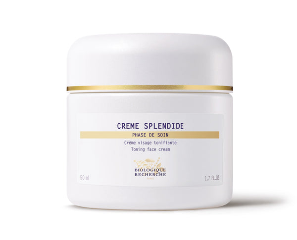 The Biologique Recherche Crème Splendide comes in a white jar adorned with a gold stripe near the lid. Labeled as a toning face cream for aging skin, this luxurious product aims to firm and enhance radiance and vitality.