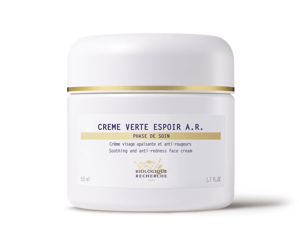 A 50 ml white jar of Biologique Recherche Crème Verte Espoir A.R. face cream, with gold accents and anti-redness label, offers soothing relief for rosacea-prone skin.