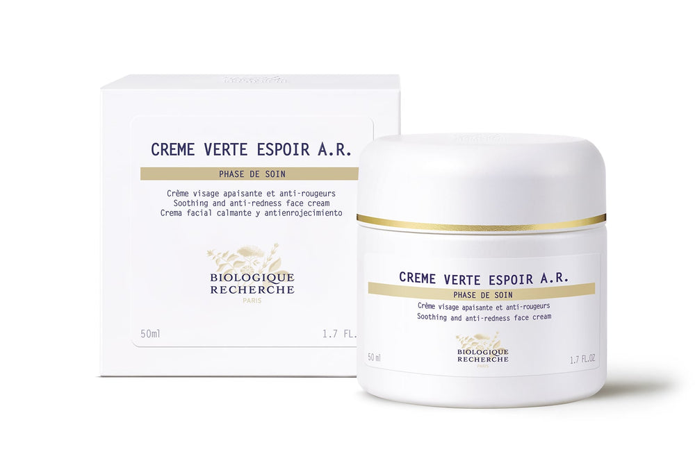 A 50 ml white jar of Biologique Recherche Crème Verte Espoir A.R. face cream, with gold accents and anti-redness label, offers soothing relief for rosacea-prone skin.
