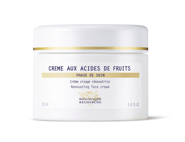 The 30ml white jar, labeled "Biologique Recherche Crème Aux Acides De Fruits," is designed for face care. Infused with a Fruit Acid Complex, it helps reveal a healthy peach complexion.