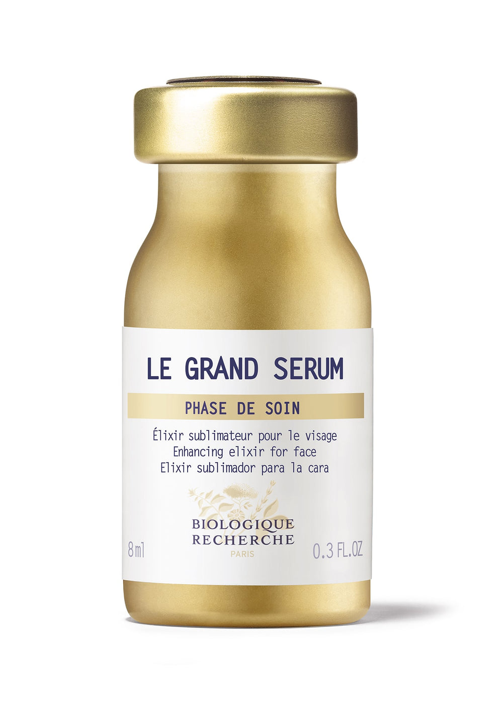 The Biologique Recherche Le Grand Serum, in a gold 0.3 oz bottle, features multilingual text and is marketed as an enhancing facial elixir to fight premature aging. It’s enriched with antioxidants for deep moisturization.