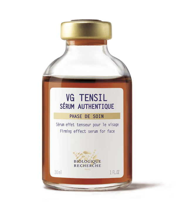 A 1 oz bottle of Serum VG Tensil by Biologique Recherche provides a facial treatment to tighten and firm the skin, featuring a gold cap and white label for authentic rejuvenation.