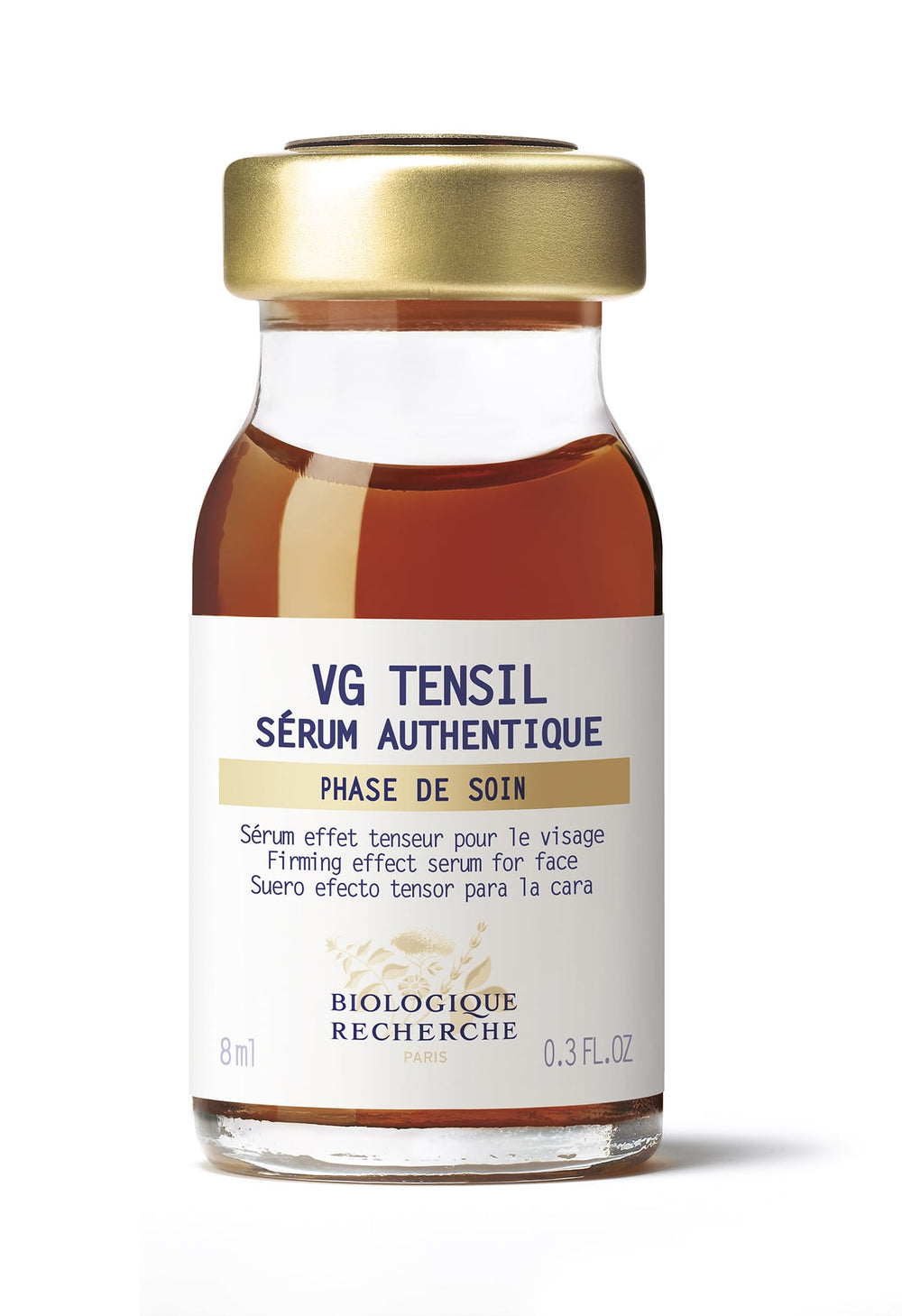 A bottle of Serum VG Tensil 0.3oz for firming facial care, 8 ml, with a gold cap and white label.