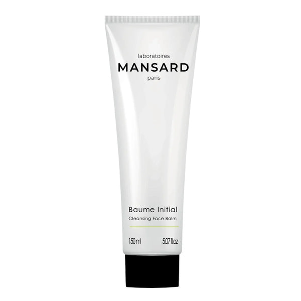 A white tube labeled "Mansard Baume Initial - Cleansing face balm," 150 ml, with a black cap—a gentle makeup remover and cleansing balm formulated with nourishing squalane.