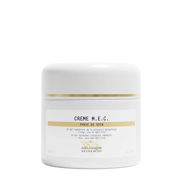 A white jar of Crème M.E.C with a gold stripe and detailed label—a restructuring treatment formulated to reduce visible signs of aging for mature skin.