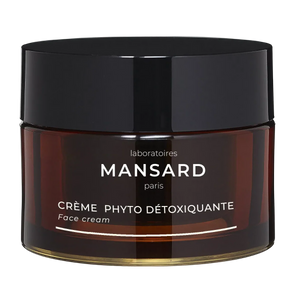 A brown jar of Creme Phyto Detoxquiante face cream with a black lid and white label.