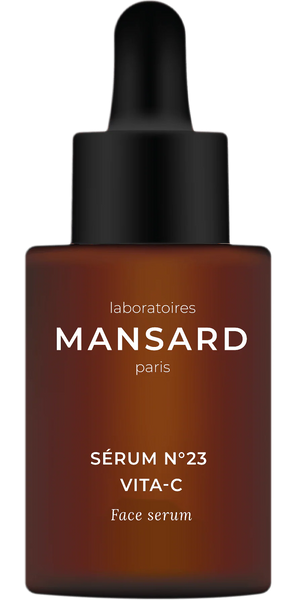 A brown dropper bottle labeled "Mansard Sérum No. 23 Vita-C" with a black cap and white text, designed to provide antioxidant protection and brighten the skin.
