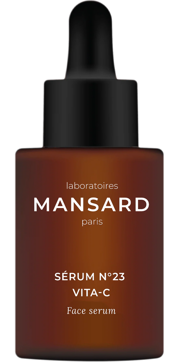 A brown dropper bottle labeled "Mansard Sérum No. 23 Vita-C" with a black cap and white text, designed to provide antioxidant protection and brighten the skin.